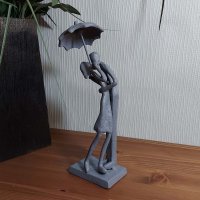 UMBRELLA COUPLE COURTING Elur Iron Figurine